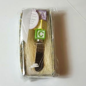 Alaphabet spreading knife